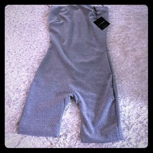 J lux label Silver strapless jumpsuit with nwot tag fell off never worn